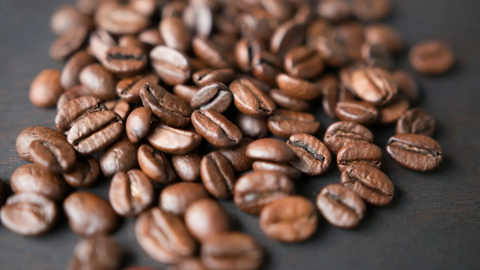 A pile of freshly roasted coffee beans