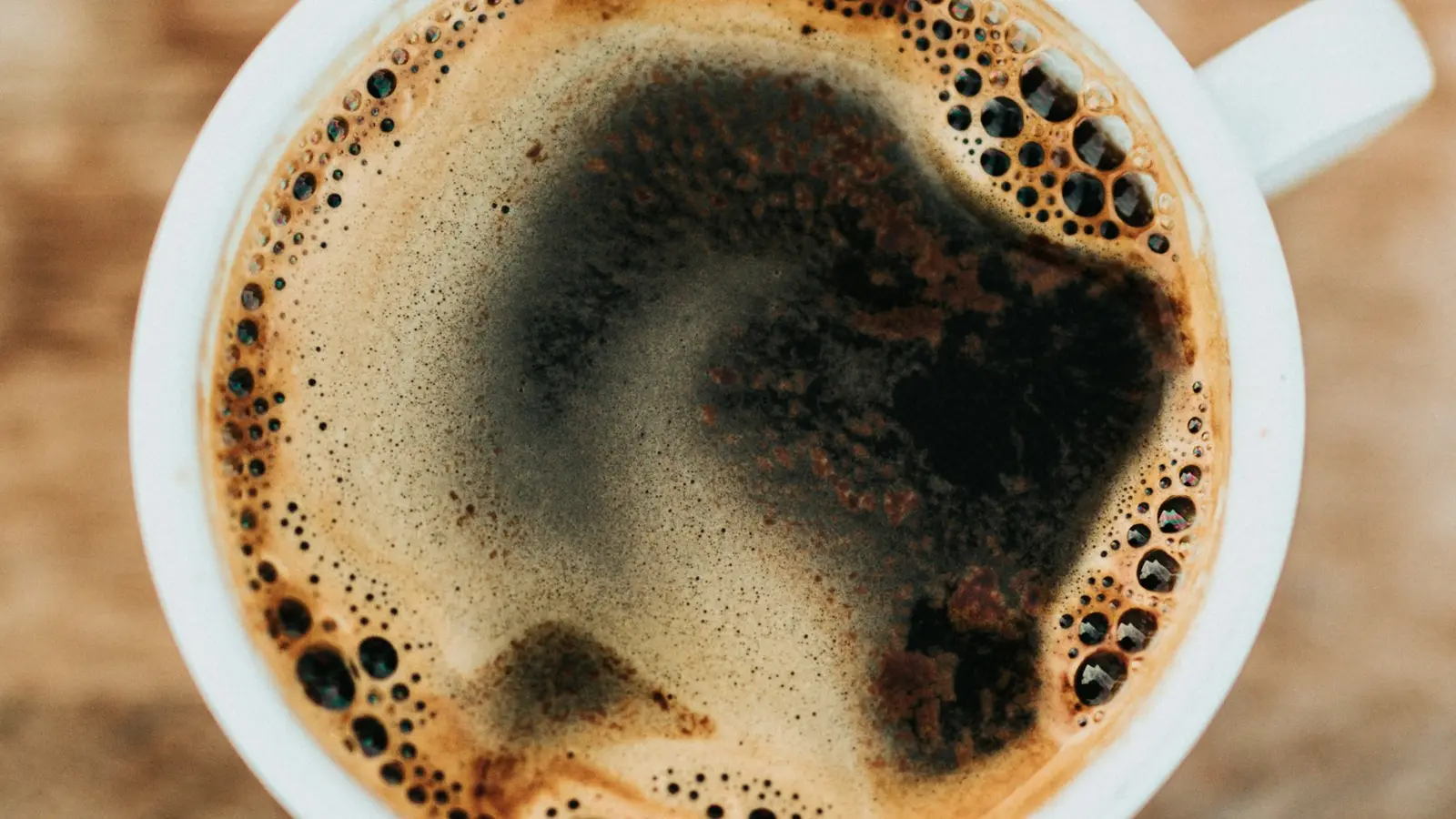 Close-up of a cup of coffee with crema