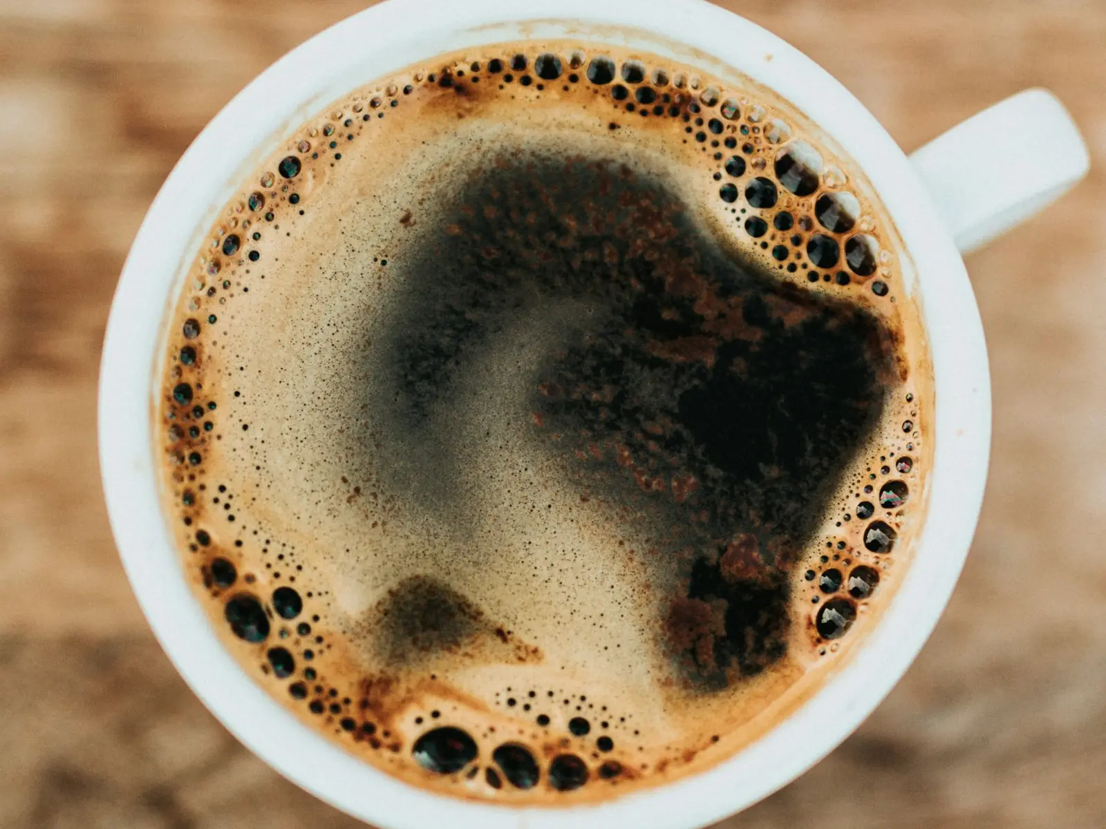 Close-up of a cup of coffee with crema