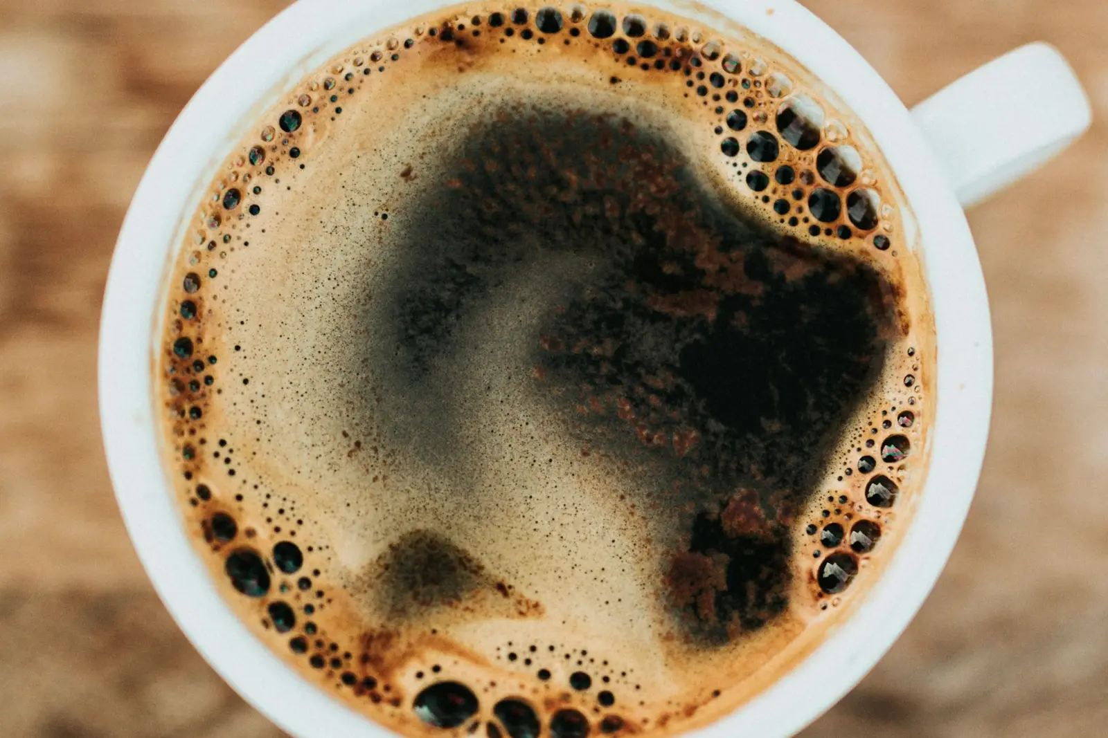 Close-up of a cup of coffee with crema